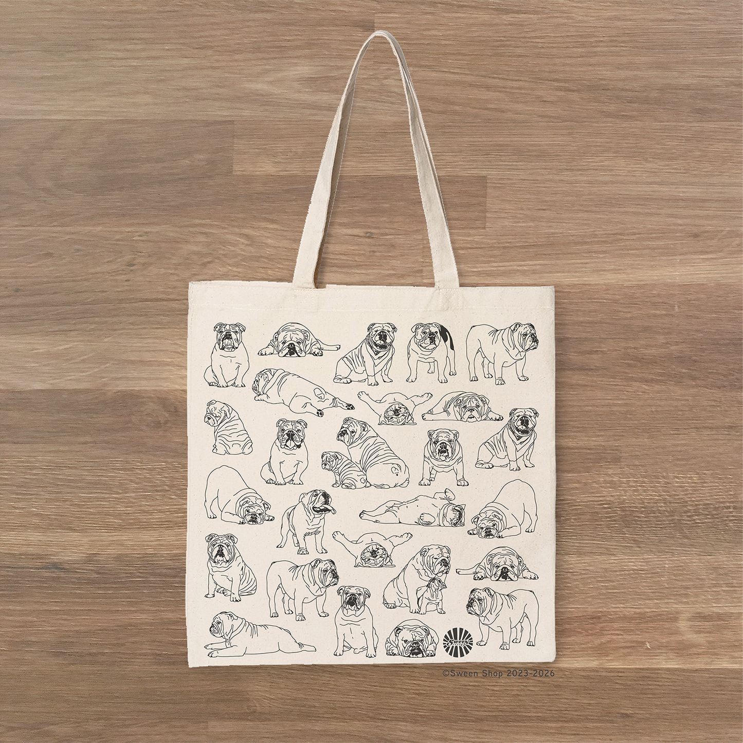 Tote bag with bulldog pet dog hand drawn illustration on a wooden surface