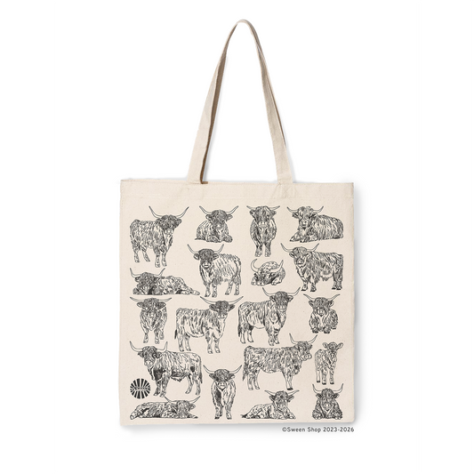 natural cotton canvas tote bag with black line drawing of highland cow illustrations on a white background