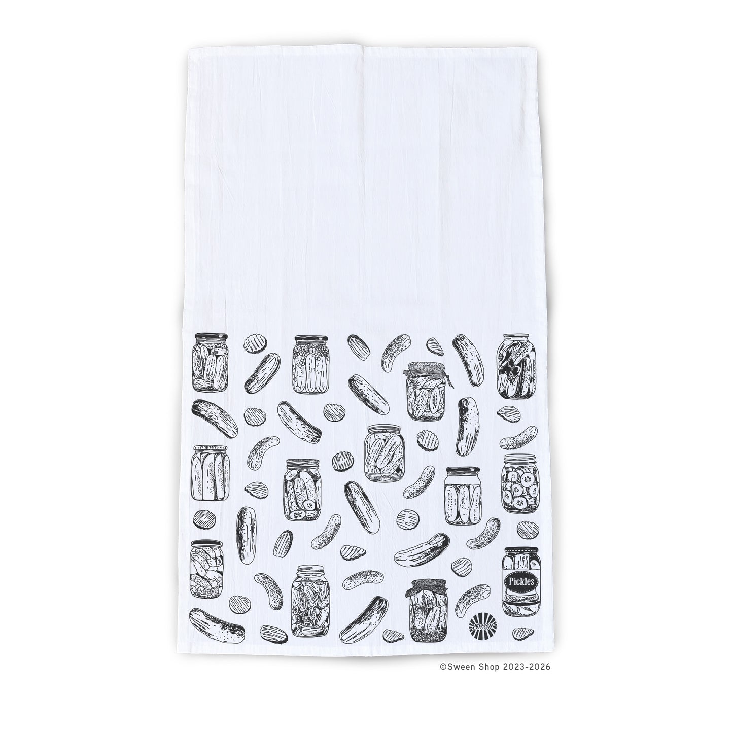 White towel with black line drawing of pickle and jar pattern on a white background