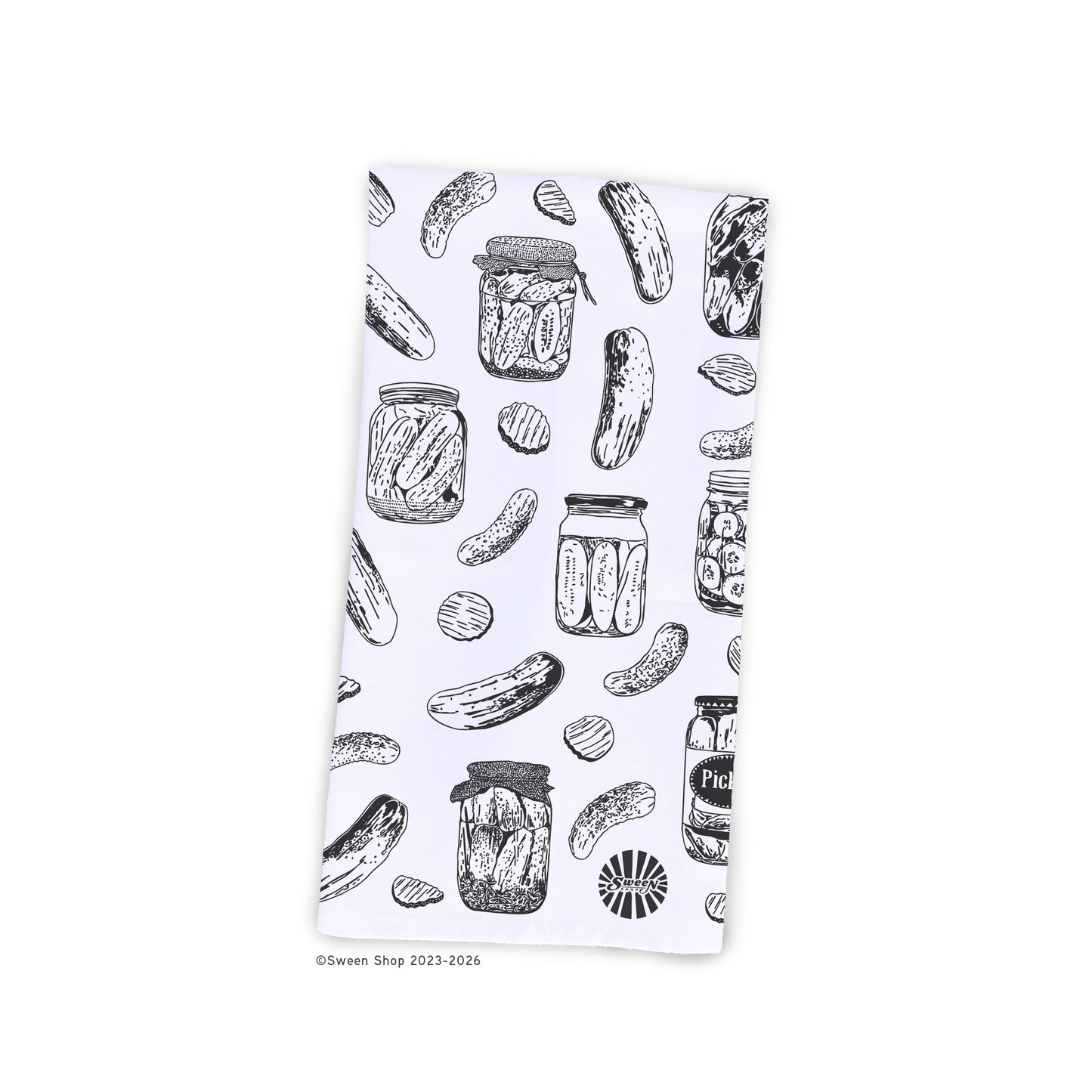 kitchen towel with black and white pickle and jar pattern on a white background