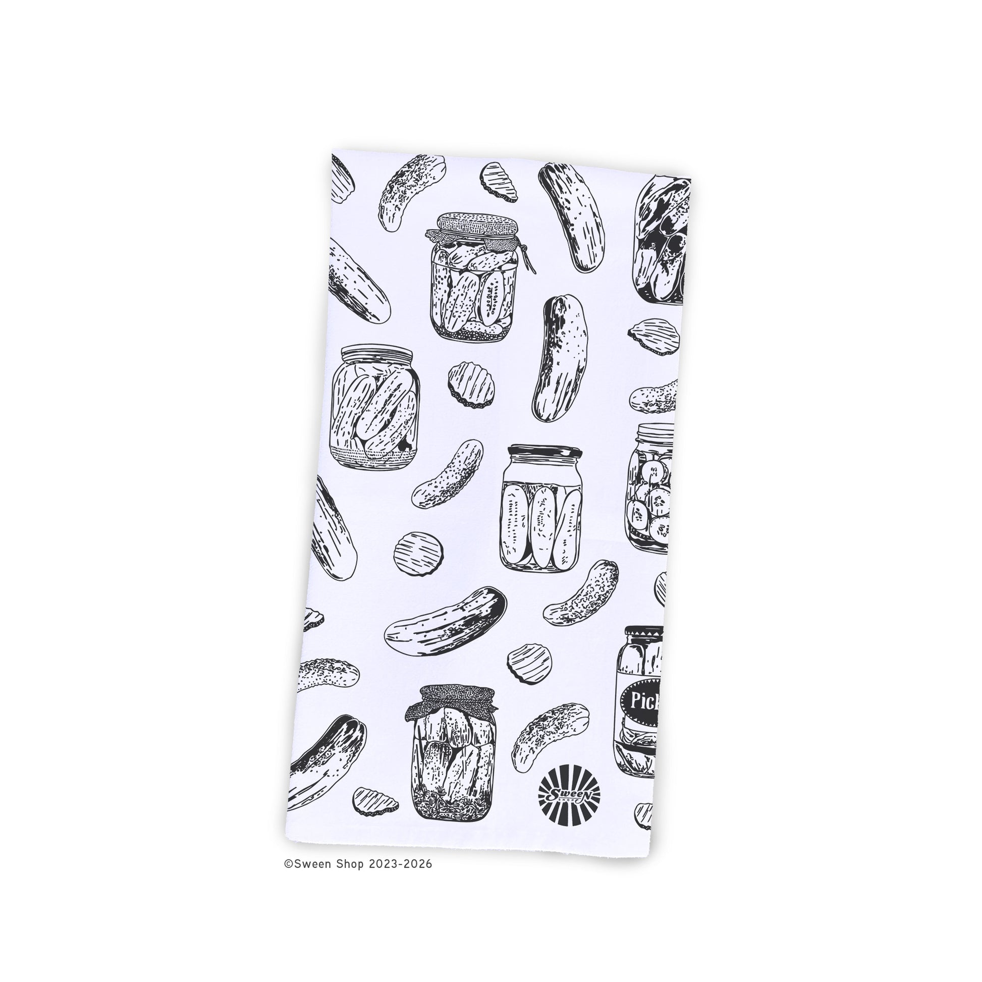 kitchen towel with black and white pickle and jar pattern on a white background