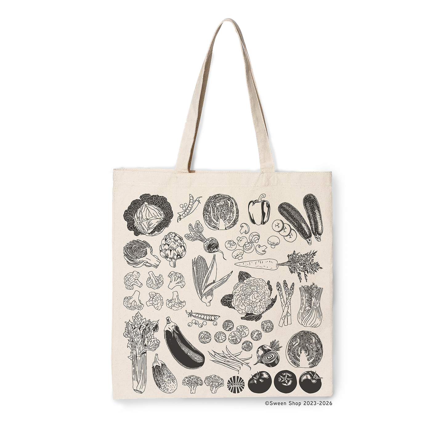Natural cotton canvas tote bag with black hand drawn vegetable illustrations on a white background