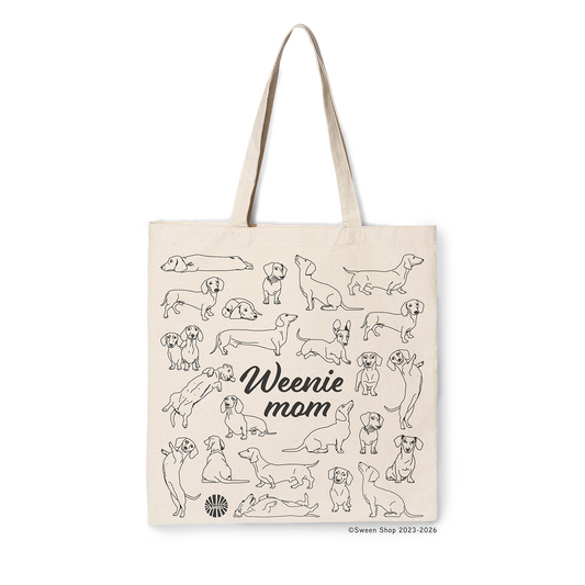 Natural cotton canvas Tote bag with 'Weenie mom' text and dog illustrations on a white background
